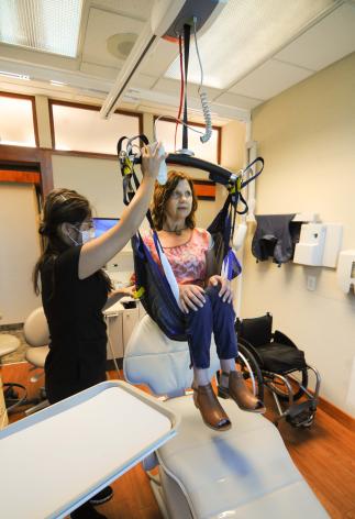 Ceiling transfer lift for wheelchair accessible dentistry